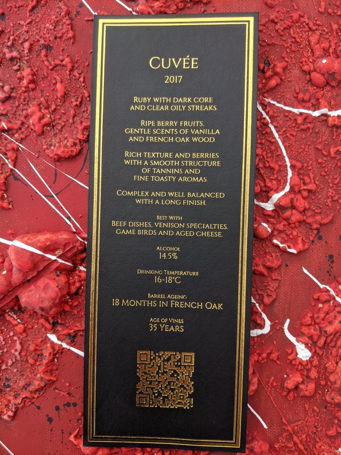 Bottle resting in the velvet lined inner box